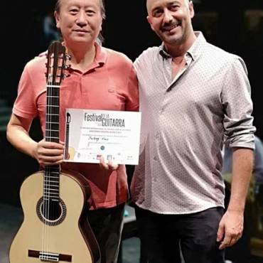 Buy Yulong Guo Guitar from China Aiersi Guitar